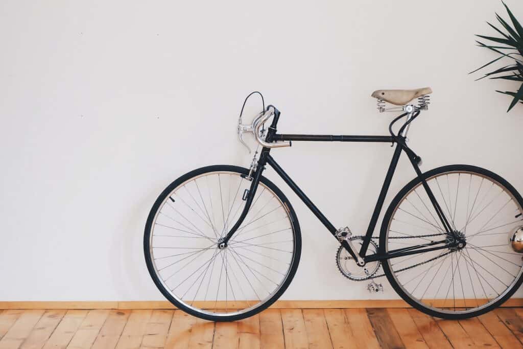 a bike standing by the wall